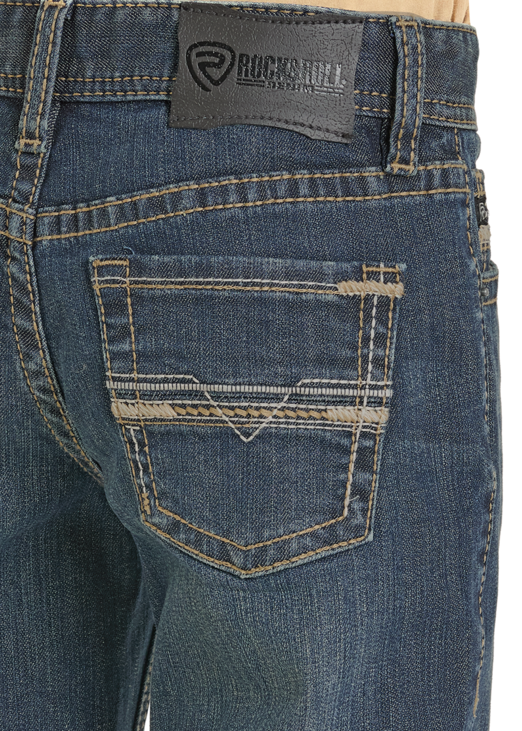 Close-up of the back pocket of Boys' Regular Fit Step Pocket Stitch Bootcut Jeans by Rock & Roll Denim, crafted from blue cotton denim with tan stitching and a black leather brand patch on the waistband.
