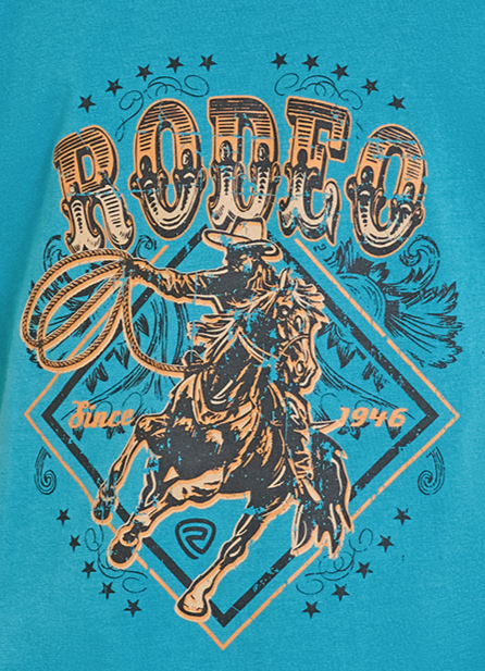 The Boys' Rodeo Graphic Tee from Rock & Roll Denim showcases a cowboy riding a bucking horse with a lasso, stars, and “RODEO” above. “Since 1946” flanks the graphic for a classic western vibe.