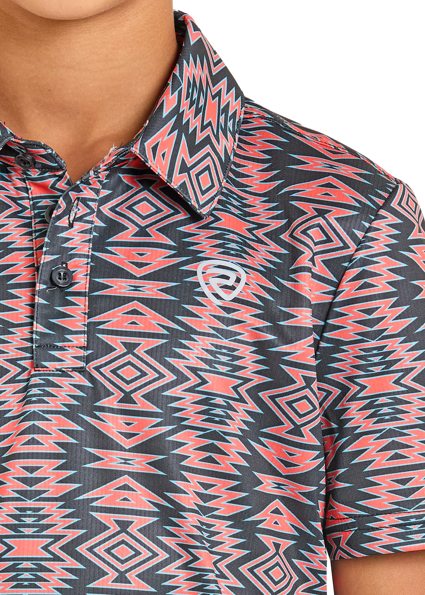 Close-up of a patterned shirt with geometric design in red and black on a white background