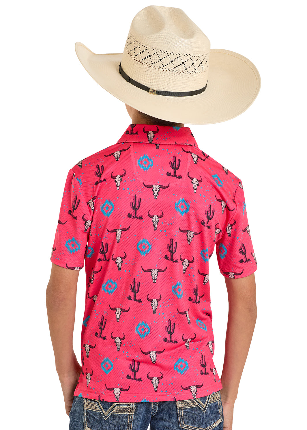Person wearing a pink shirt with cowboy pattern and a straw hat on a white background