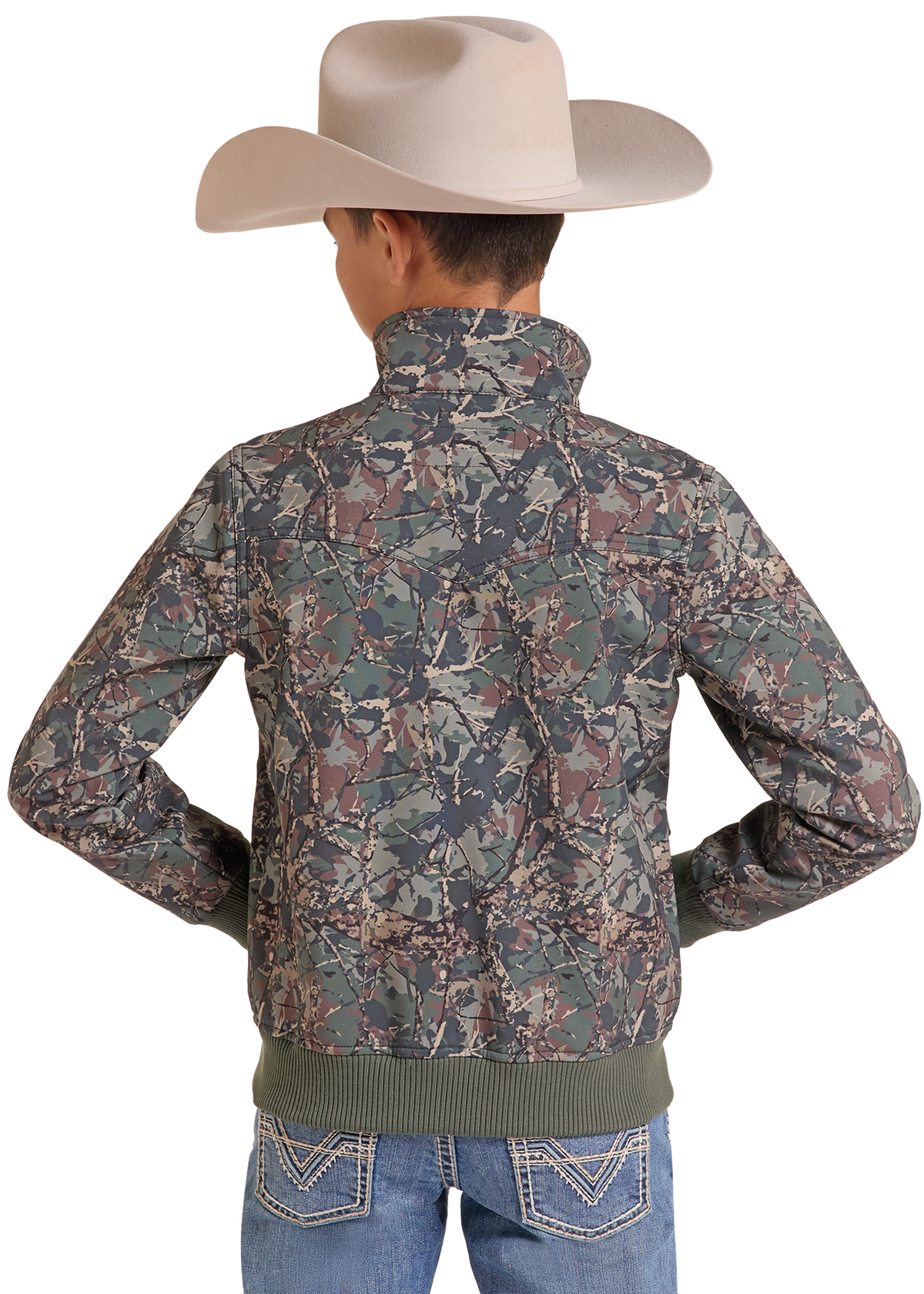 A child model from the back wearing a camouflage print jacket with an olive green ribbed hem, blue jeans, and a light beige cowboy hat, set against a plain white background.