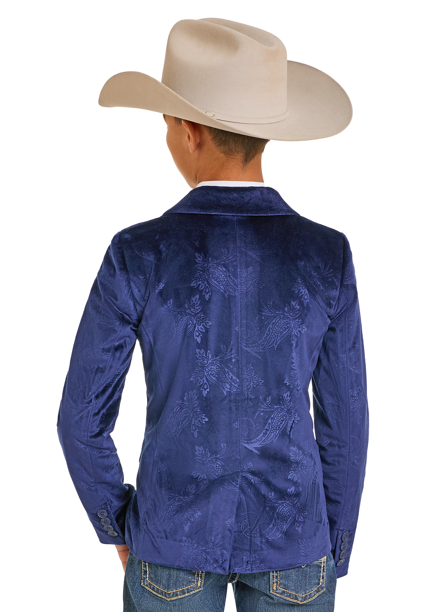 A child wearing a beige cowboy hat, jeans, and a Rock & Roll Denim Boys' Paisley Velvet Sports Coat is shown from the back against a white background.