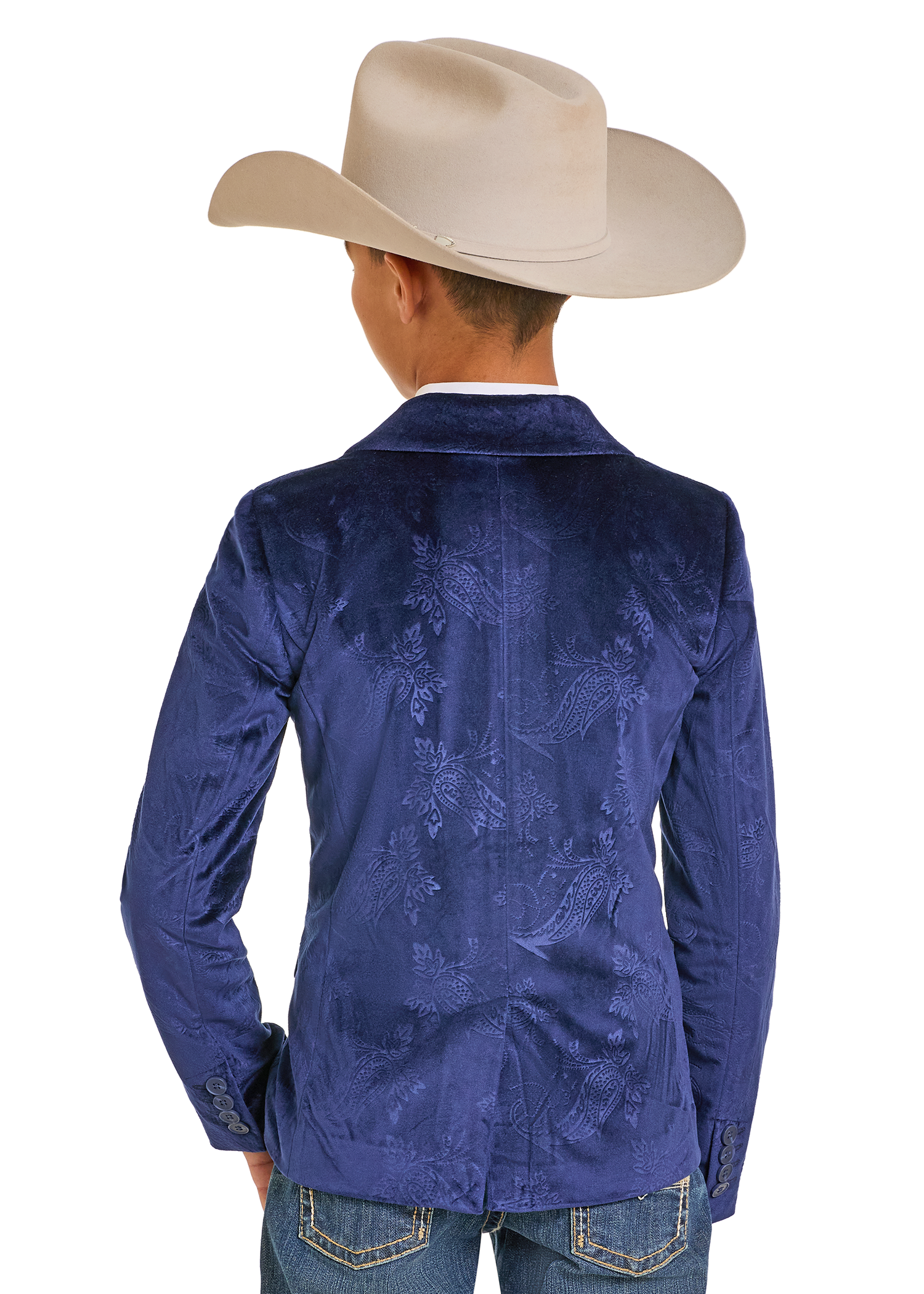 A child wearing a beige cowboy hat, jeans, and a Rock & Roll Denim Boys' Paisley Velvet Sports Coat is shown from the back against a white background.