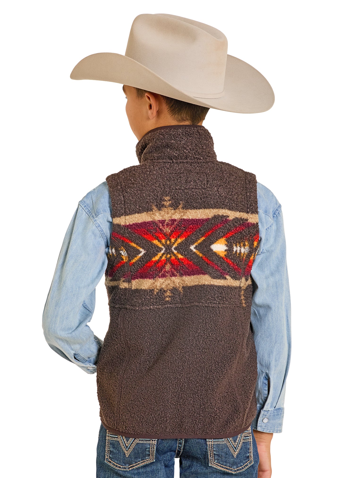 Child wearing a brown vest with a colorful pattern, blue shirt, and cowboy hat on a white background