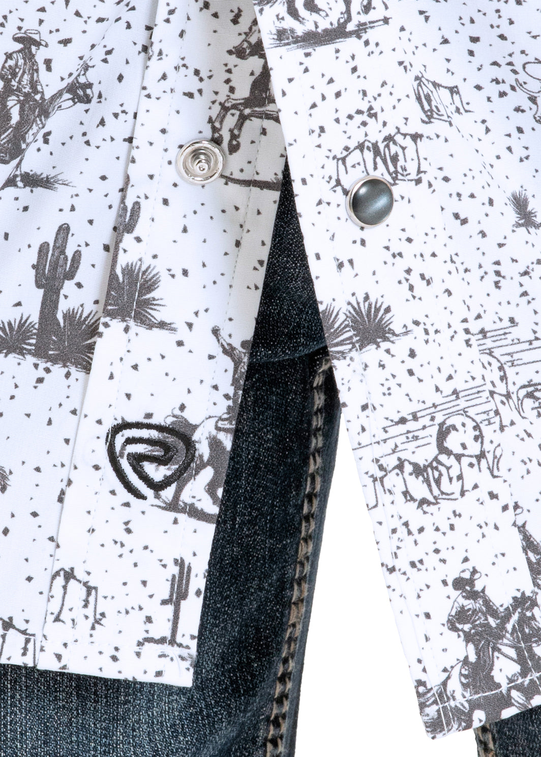 Close-up of a patterned shirt with black buttons.