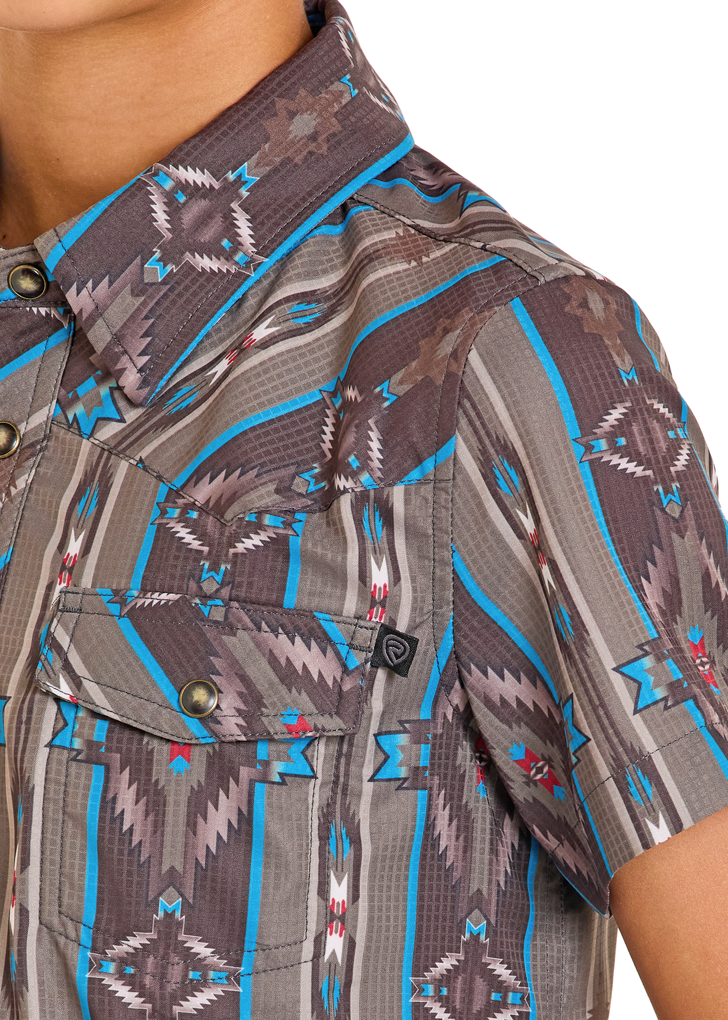 Close-up of a patterned shirt with geometric design
