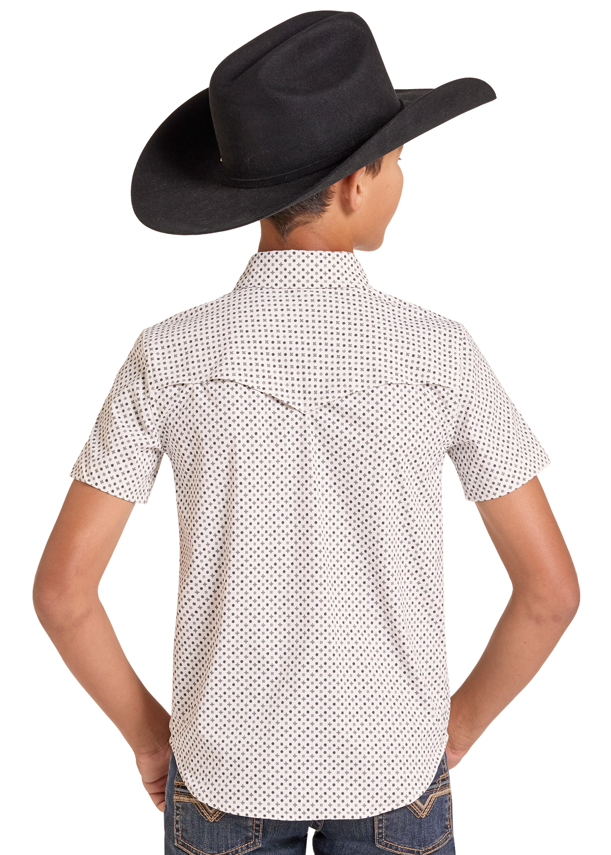 A child model shown from the back wearing a white short-sleeve western shirt with a small black dot pattern, paired with a black cowboy hat and blue jeans, against a plain white background.