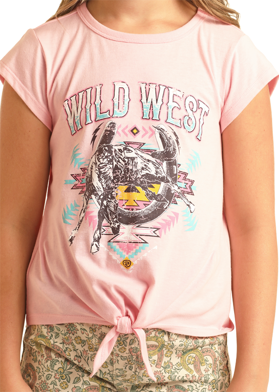A child wears the Rock & Roll Denim Girls' Wild West Graphic T-Shirt, tied at the waist and styled with light-patterned shorts for a playful, adventurous vibe.