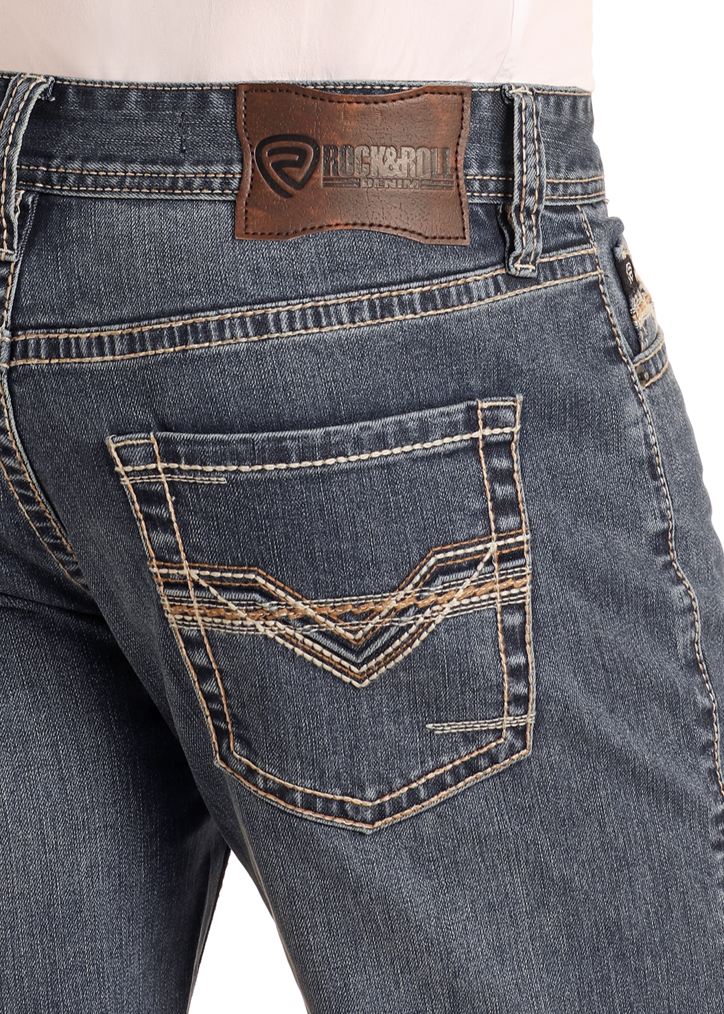 Close-up of the back of a person wearing Relaxed Fit Feather Stitch Bootcut Jeans with decorative stitching on the pockets and a brown leather Rock & Roll Denim patch on the waistband.