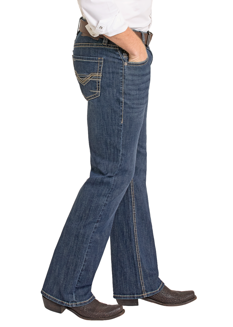 A person in a white shirt, Relaxed Fit Classic Pleather V Bootcut Jeans by Rock & Roll Denim, a brown belt, and brown textured cowboy boots stands with one hand in their pocket against a white background.