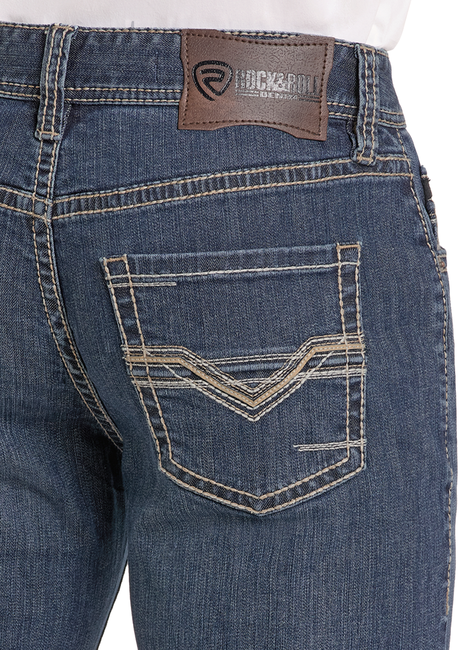 Close-up of the back pocket of Relaxed Fit Classic Pleather V Bootcut Jeans by Rock & Roll Denim, featuring white stitching and a brown leather patch with the logo above the pocket.