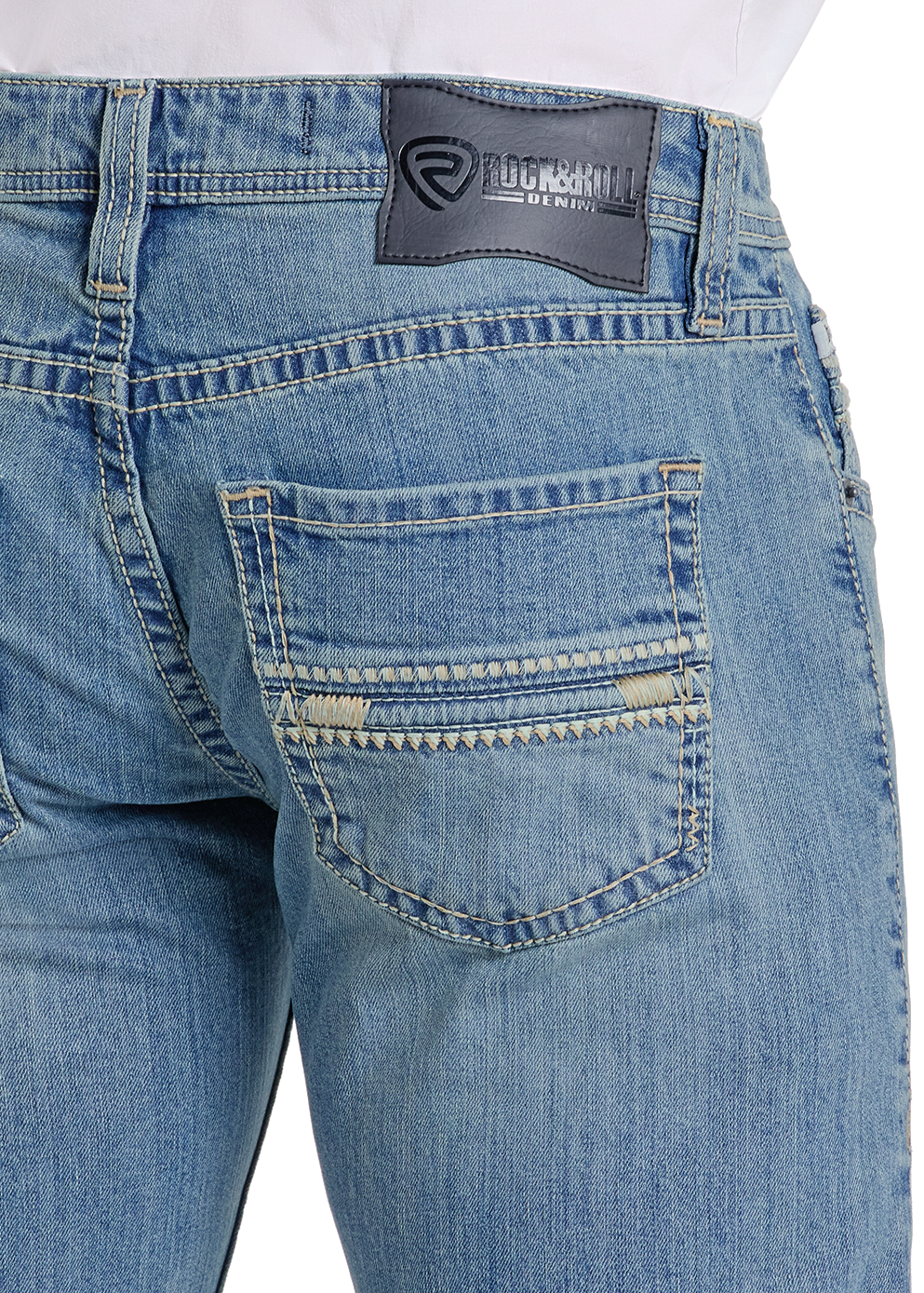 Close-up of a person wearing Rock & Roll Denim Regular Fit Ladder Stitch Bootcut Jeans in light blue, featuring visible ladder stitch back pocket detailing and a black rectangular brand patch near the waistband.