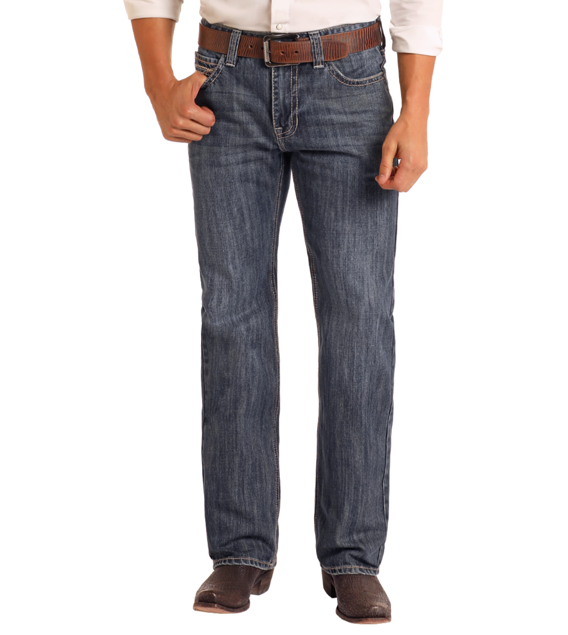 A person stands facing forward with one hand in a pocket, wearing a white shirt, Rock & Roll Denim Relaxed Fit Criss-Cross Stitch Straight Leg Jeans in medium wash, a brown belt, and brown shoes.