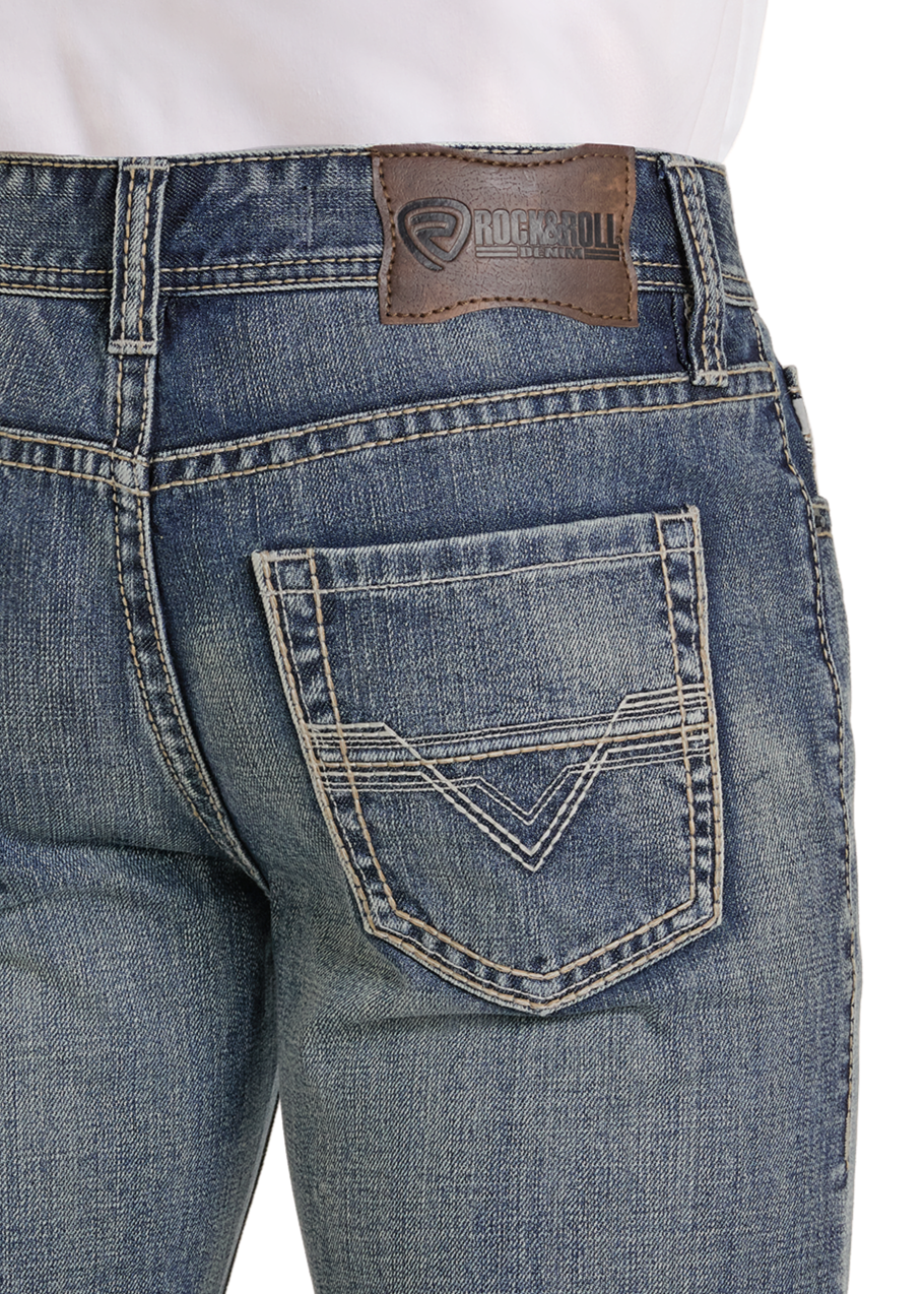 Close-up of blue jeans with a brand logo on a white background