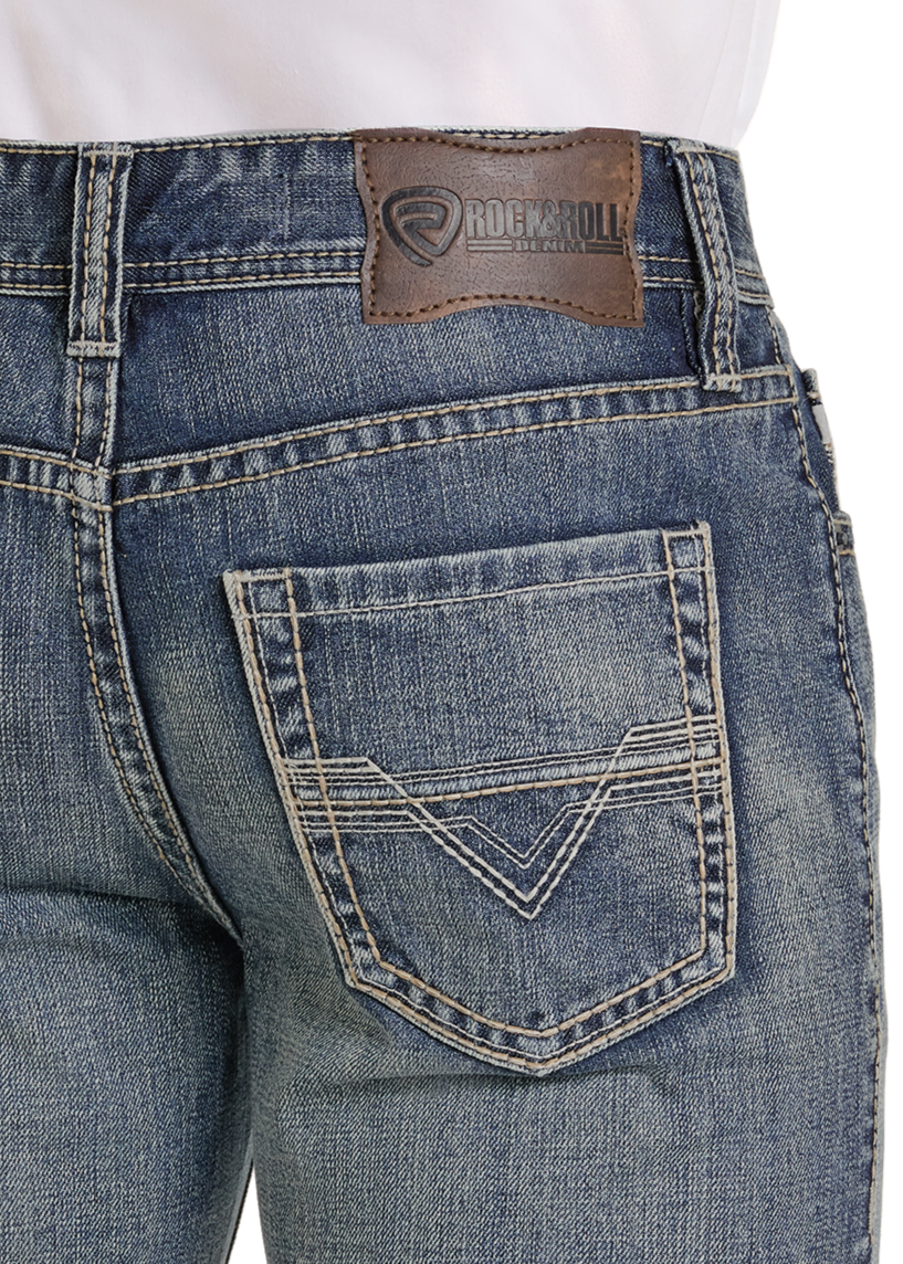 Close-up of blue jeans with a brand logo on a white background