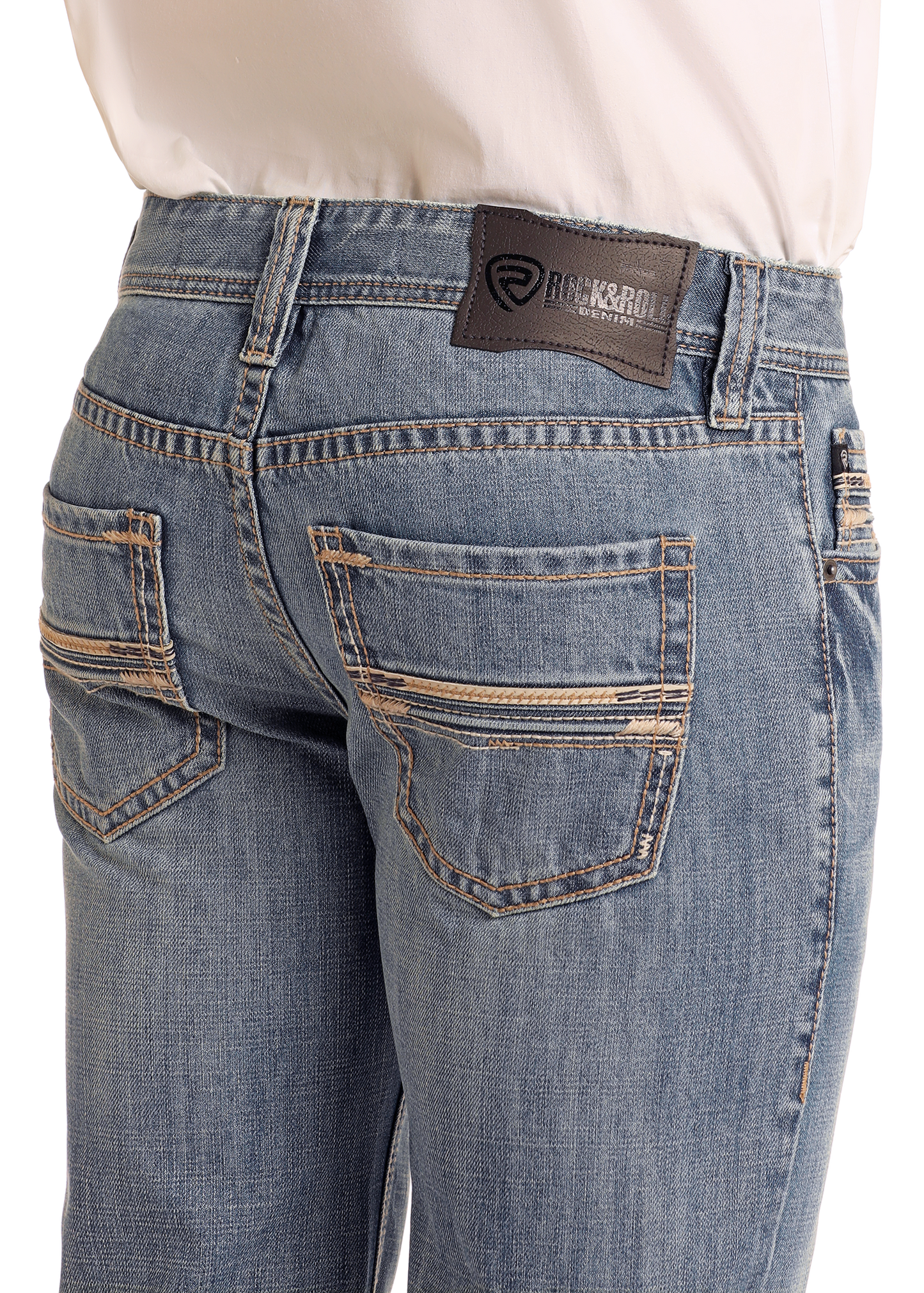 A person wearing Rock & Roll Denim Regular Fit Leather Embroidered Straight Leg Jeans, featuring light blue denim, contrast stitching, and a black brand patch on the waistband, shown from the back.