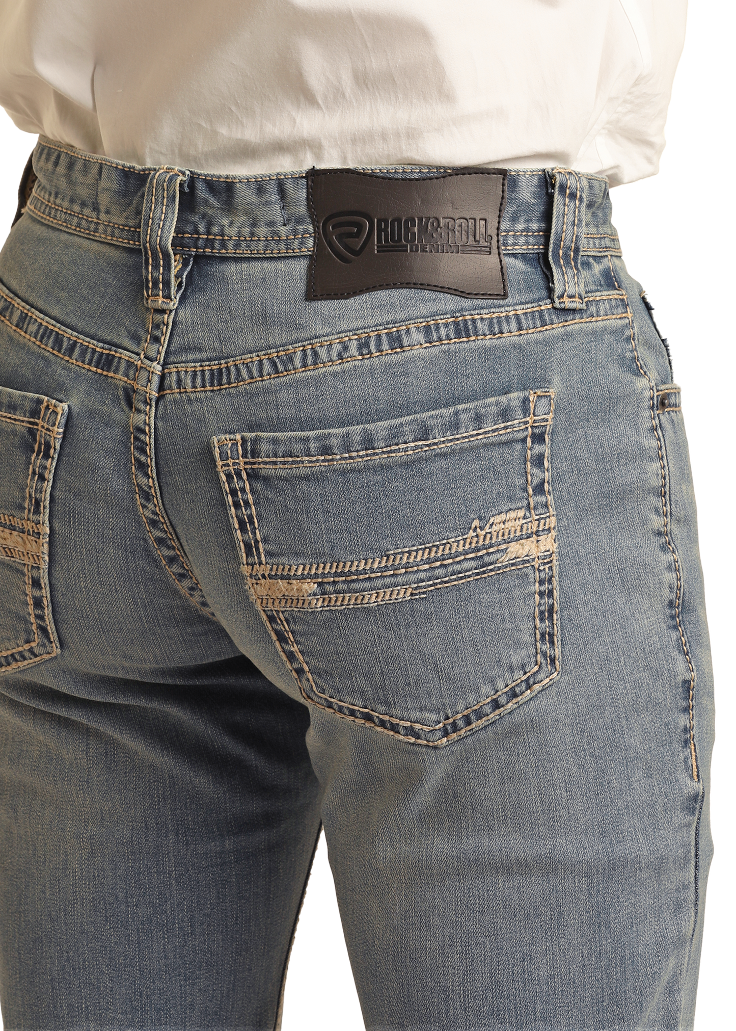 A person seen from behind wears Slim Fit Ladder Embroidered Straight Leg Jeans in light blue by Rock & Roll Denim, featuring prominent beige stitching and a black brand patch on the waistband.