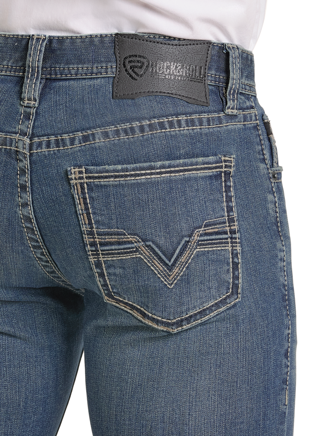 Blue jeans with a brand logo on the back pocket against a white background