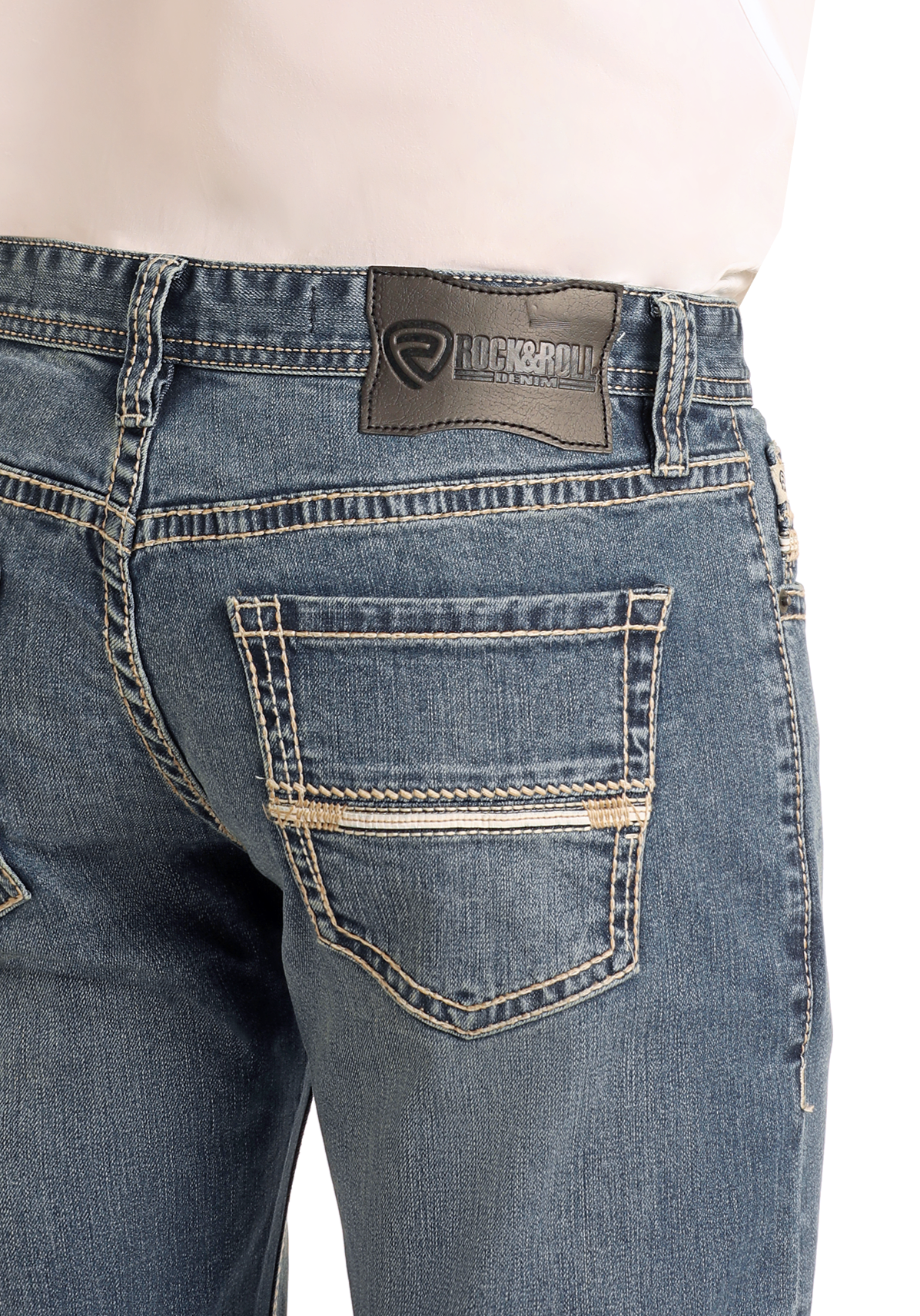 A close-up of the back pocket and waistband of Slim Fit Simple Embroidered Pocket Straight Leg Jeans by Rock & Roll Denim, showcasing prominent stitching and a black leather brand patch above the pocket.
