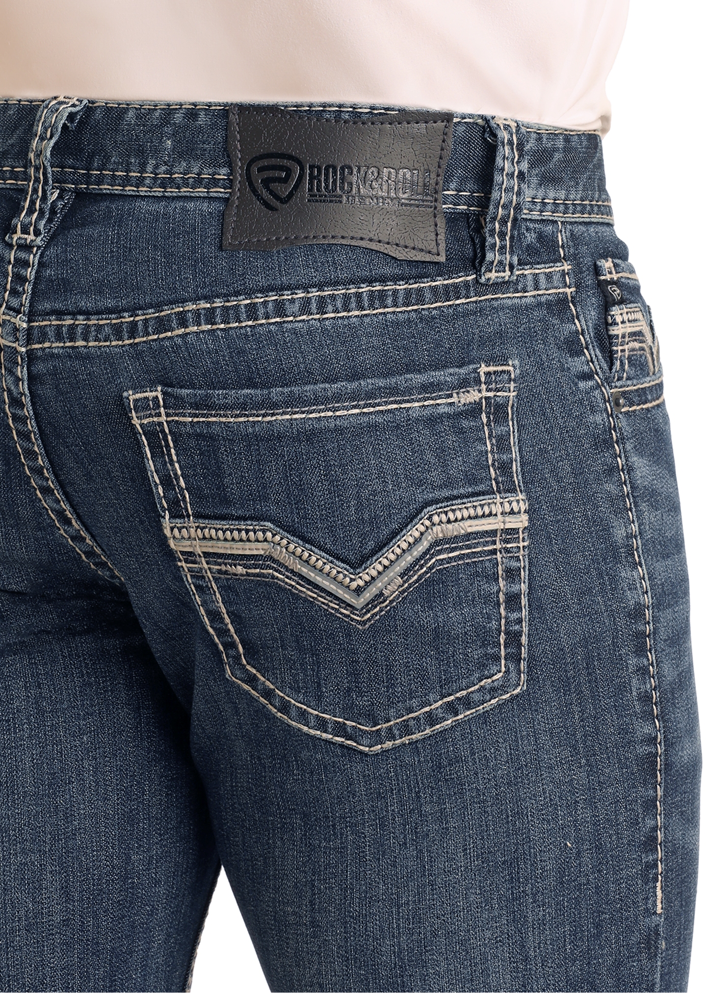 A close-up of the back of a person wearing Rock & Roll Denim Slim Fit Grey Pleather Embroidered Pocket Straight Leg Jeans, featuring white stitching and a brand patch above the right pocket, with a tucked-in light-colored shirt.