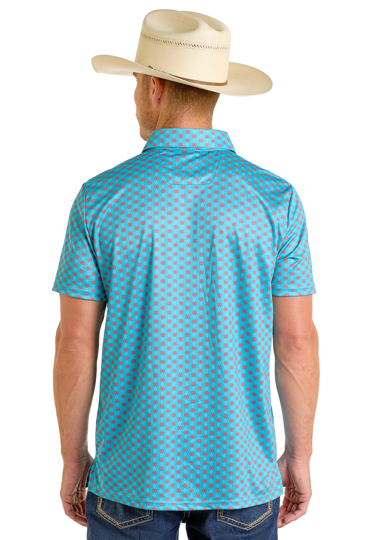 A man wearing a cream cowboy hat, blue jeans, and a Rock & Roll Denim Turquoise Geo Print Polo stands facing away from the camera against a white background.