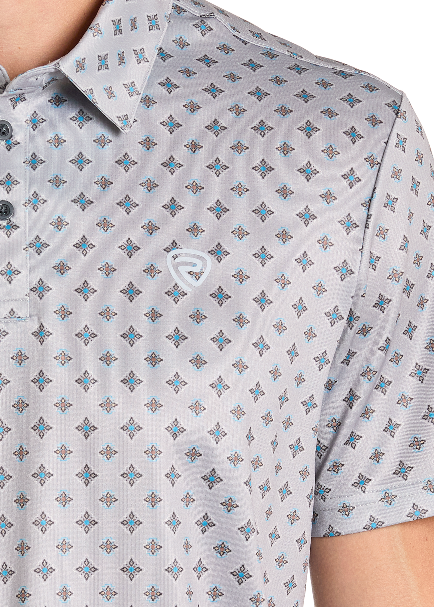 A close-up of a person wearing the Rock & Roll Denim Grey Medallion Print Polo, featuring short sleeves, buttons, a small geometric pattern, and a white embroidered logo on the chest.
