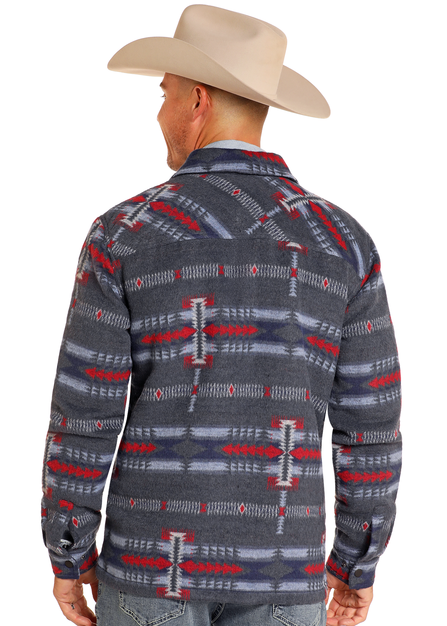 A person wearing a beige cowboy hat and a Rock & Roll Denim Blue Aztec Brushed Jacquard Zip Up Jacket, featuring red, white, and blue geometric designs, viewed from the back.