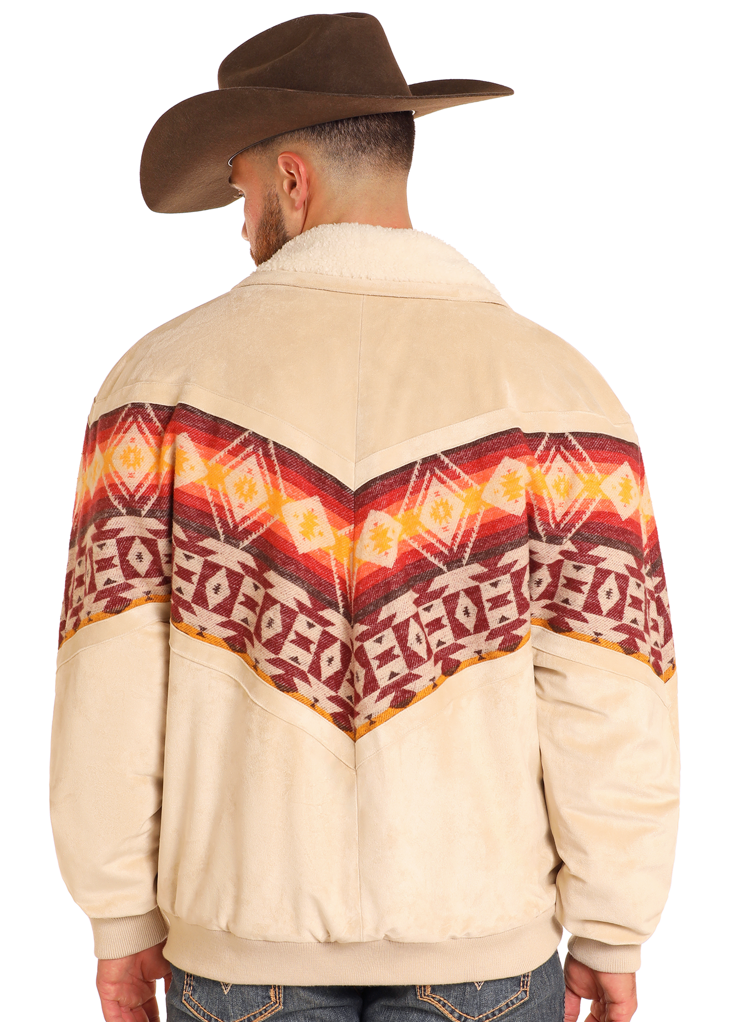 A man wearing the Rock & Roll Denim Aztec Border Print Jacquard Jacket stands facing away from the camera, showcasing its colorful Southwestern pattern across the back.