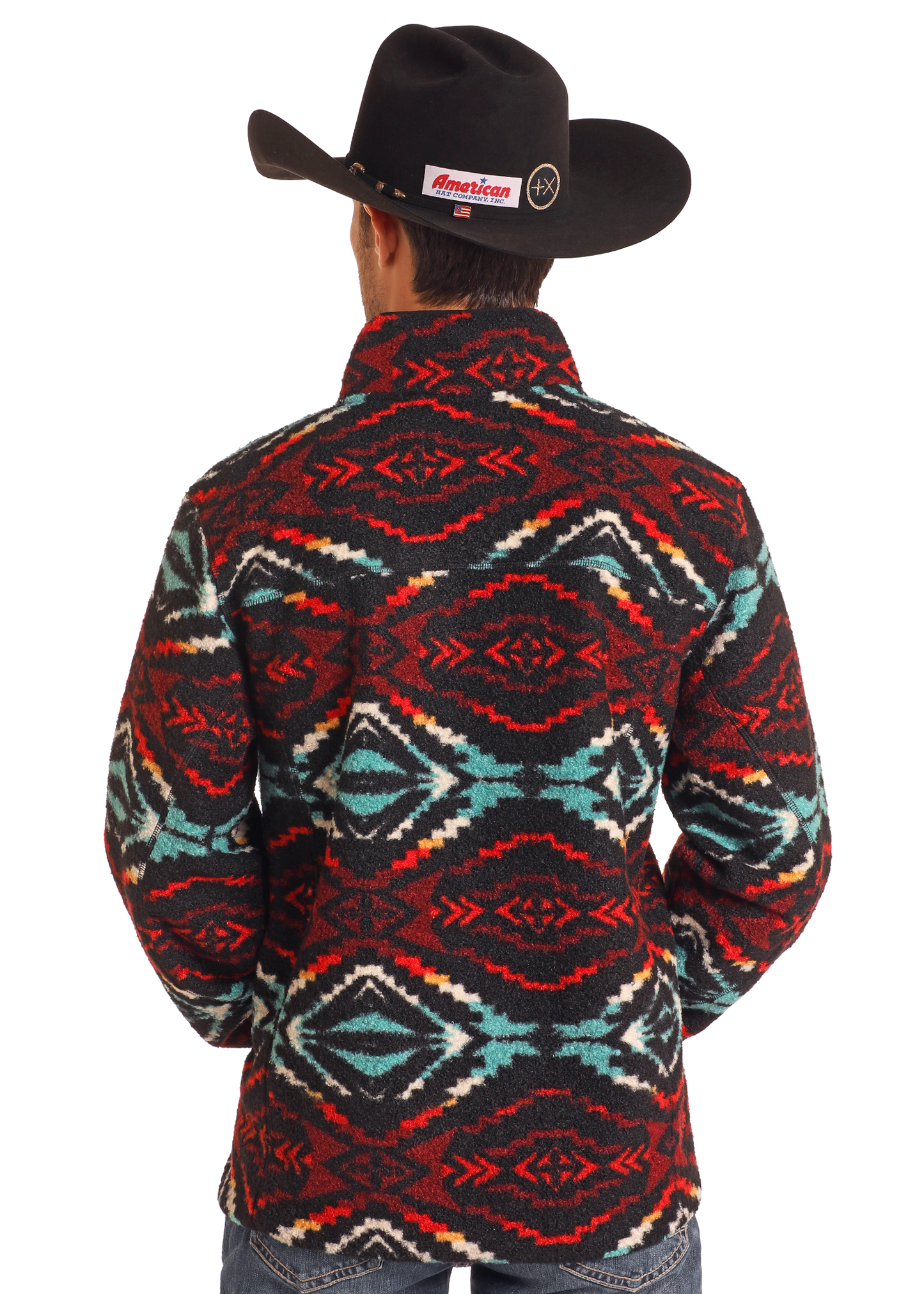 A person wearing a black cowboy hat and a Rock & Roll Denim Aztec Print Berber Jacket with bold red, black, turquoise, and white geometric patterns is shown from the back against a plain white background.