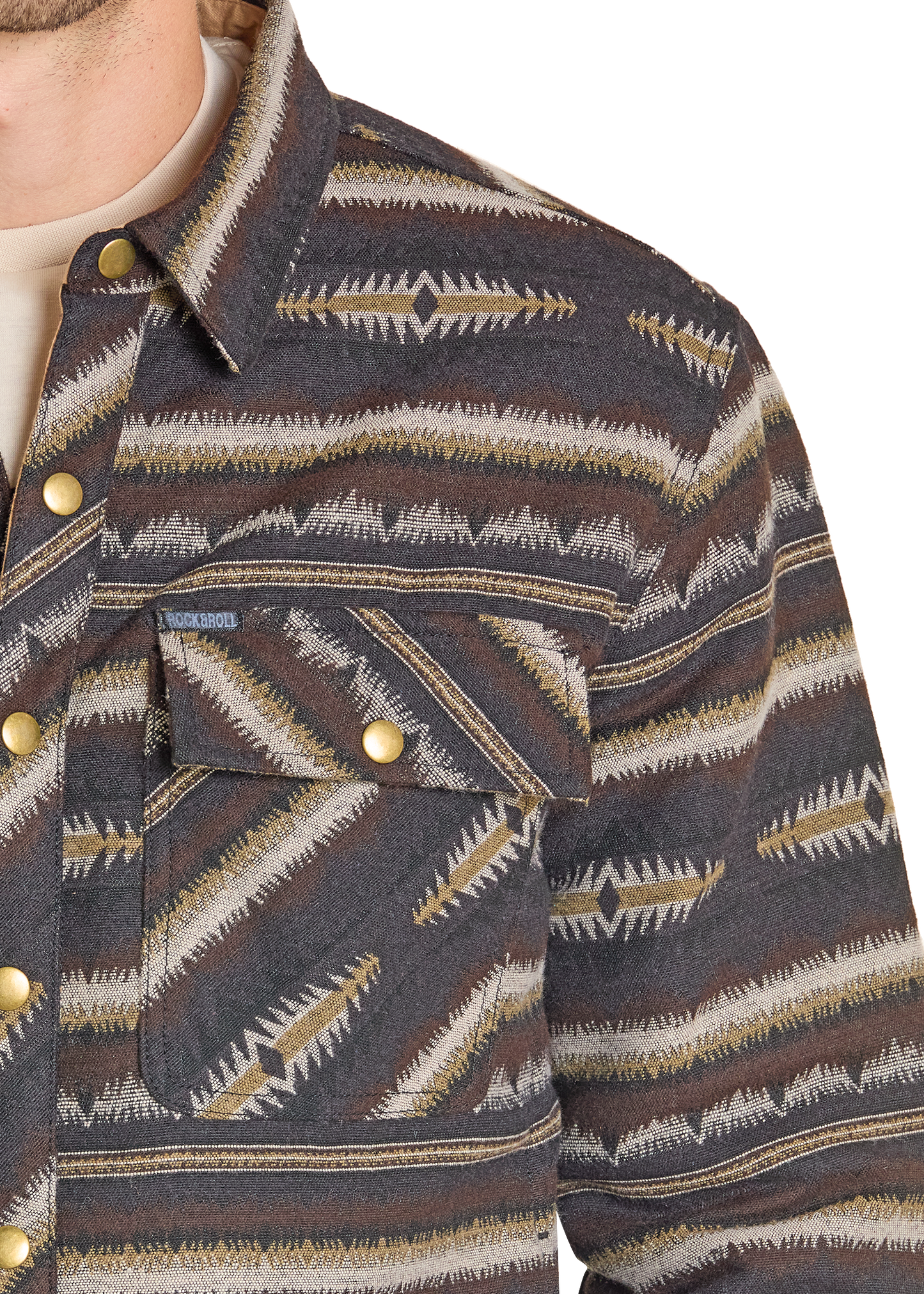 Close-up of a patterned jacket with a brand logo on a white background