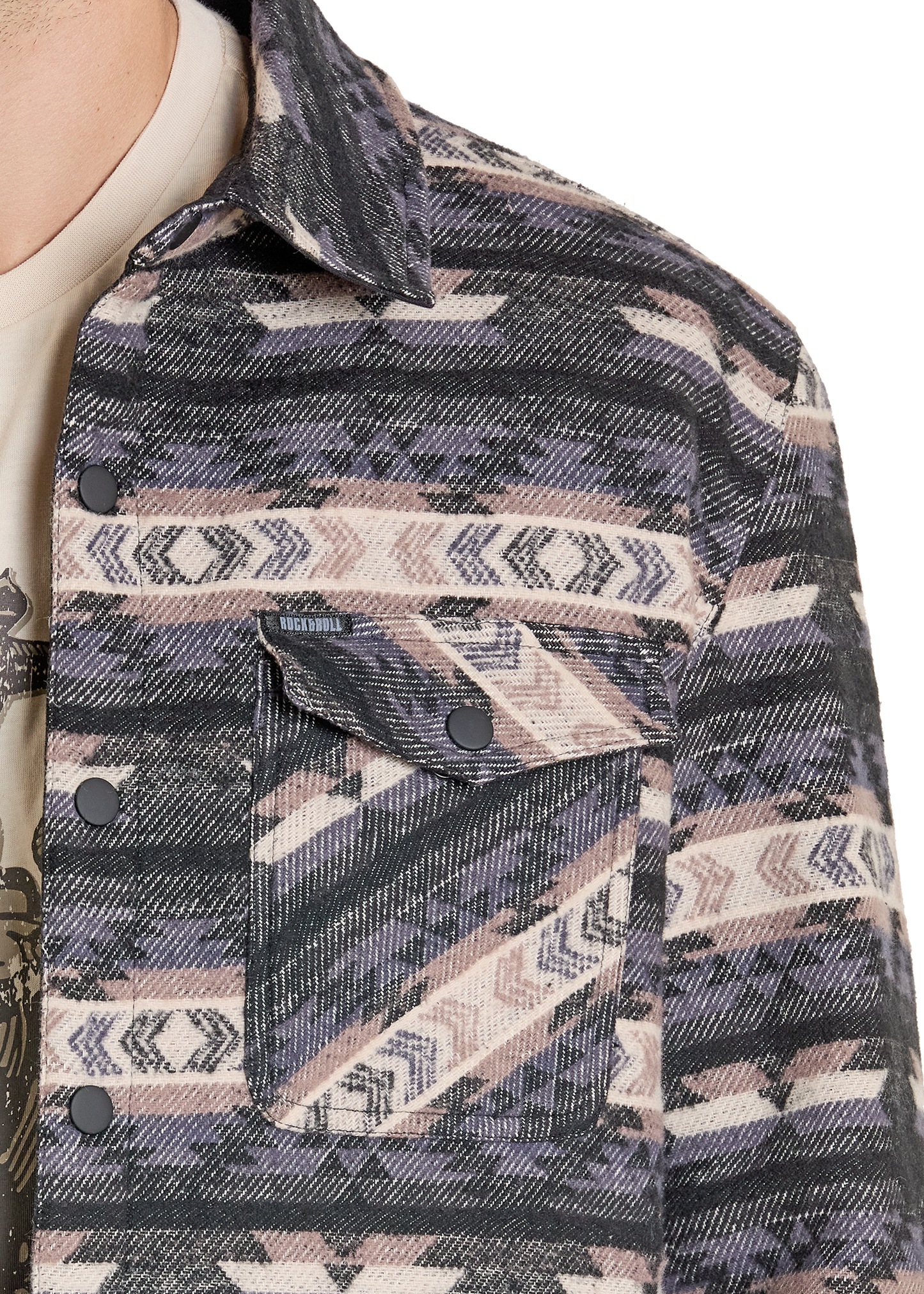 Close-up of a patterned jacket with a geometric design on a white background