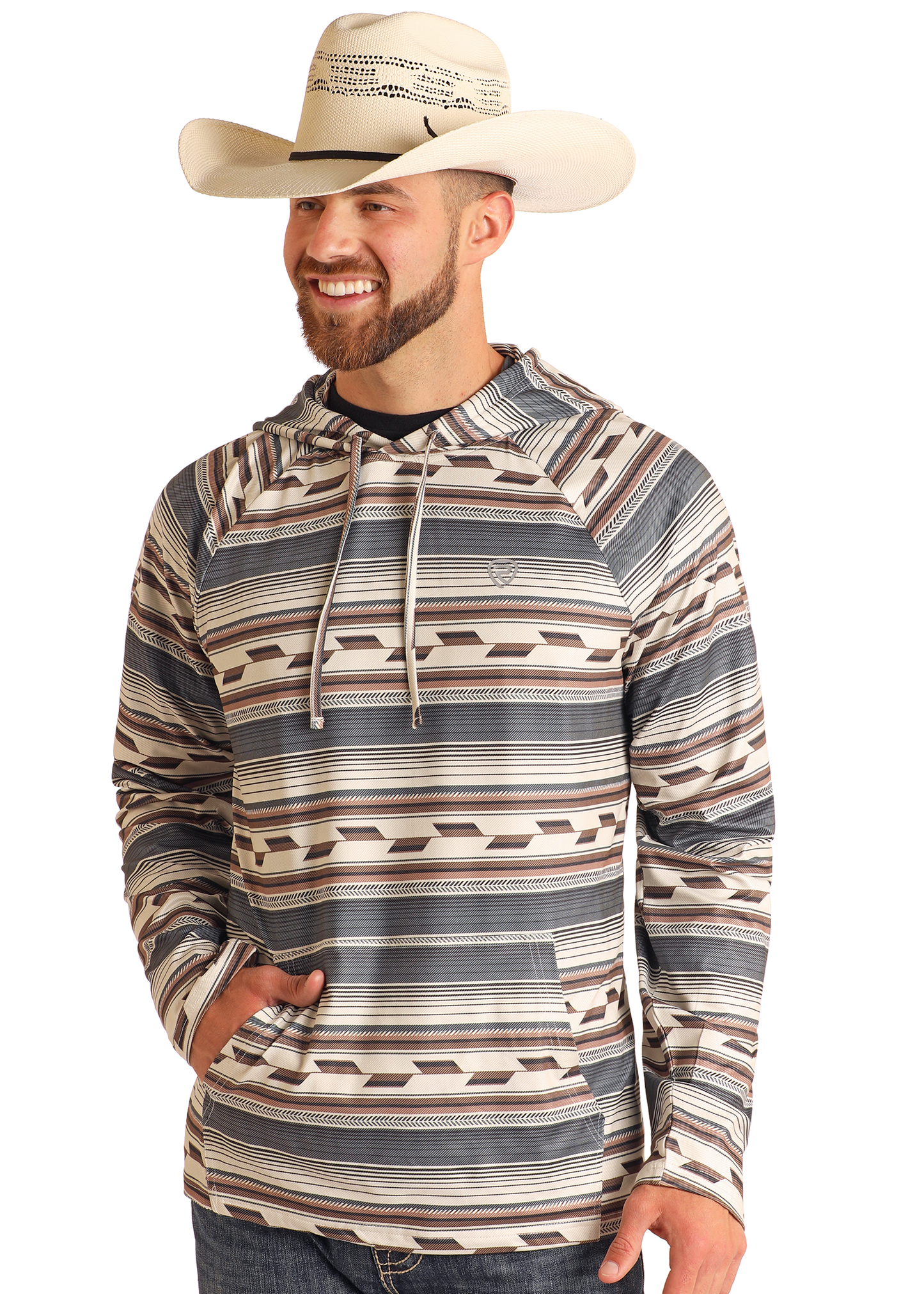 A smiling man in a wide-brimmed cowboy hat wears the Rock & Roll Denim Multi Stripe Performance Hoodie, featuring a striped pattern, front pocket, drawstrings, and comfortable stretch, standing with one hand in his pocket against a plain background.