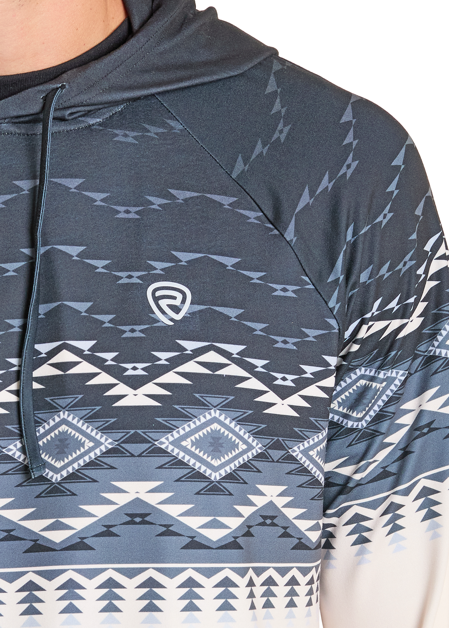 A close-up of a person wearing the Rock & Roll Denim Aztec Top Performance Hoodie in dark blue and white, featuring an Aztec design, chest logo, and drawstring hood for comfort.