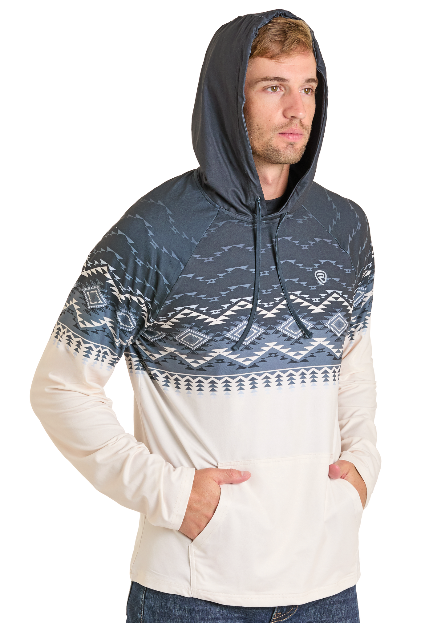 A man models the Rock & Roll Denim Aztec Top Performance Hoodie in dark blue and white, featuring a front pocket and hood, standing with hands in the pocket against a plain white background for a cozy vibe.