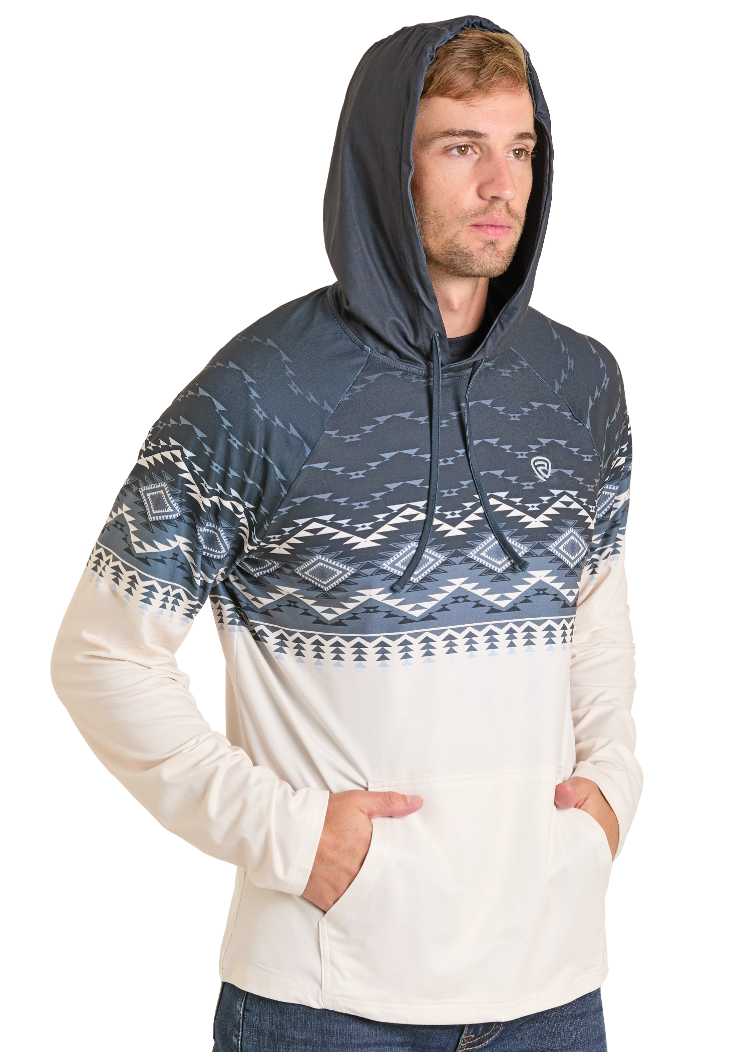 A man models the Rock & Roll Denim Aztec Top Performance Hoodie in dark blue and white, featuring a front pocket and hood, standing with hands in the pocket against a plain white background for a cozy vibe.
