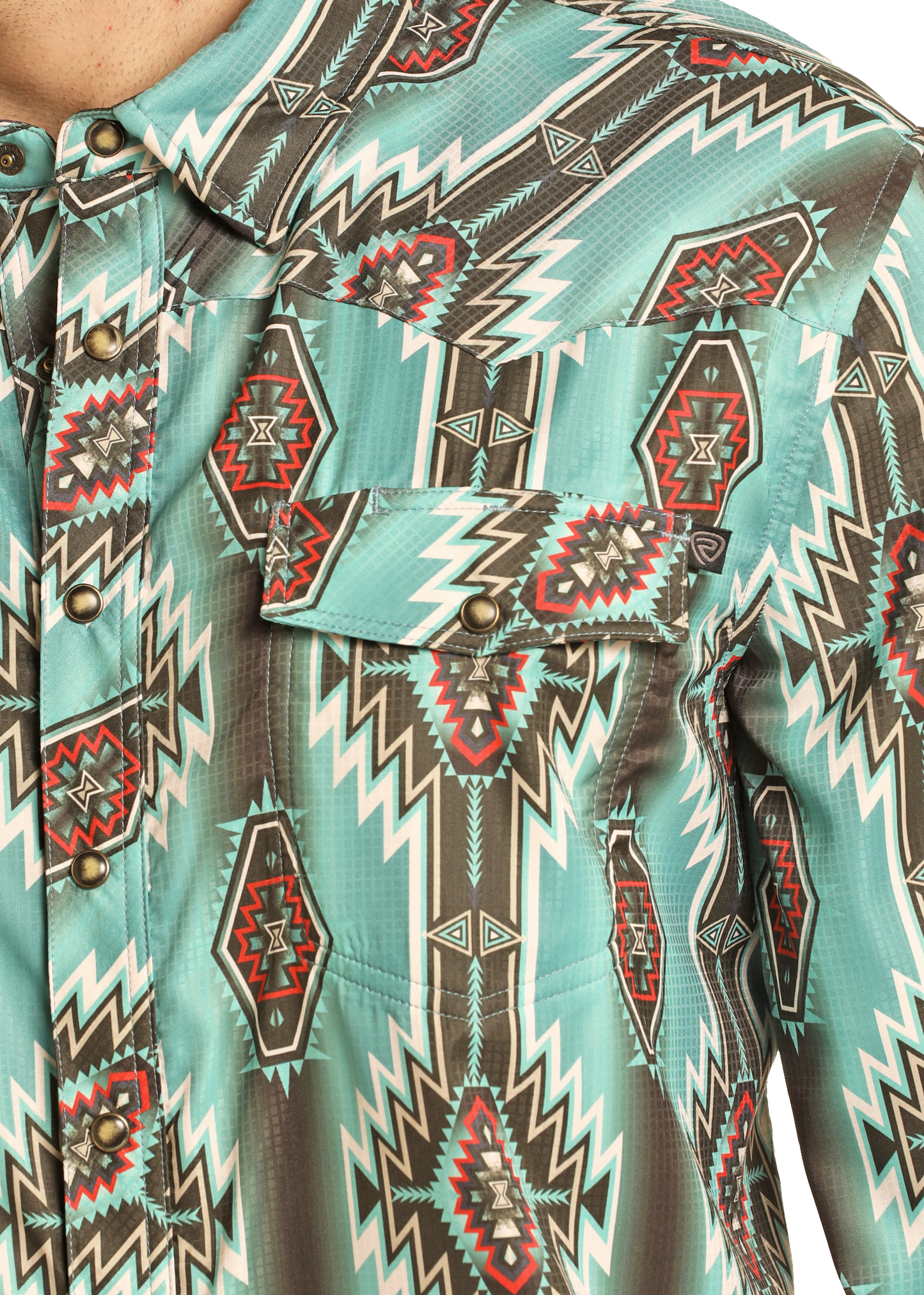 Close-up of the Rock & Roll Denim TEK Western Turquoise Aztec Long Sleeve Shirt, featuring geometric southwestern designs, snap buttons, and a flap chest pocket.