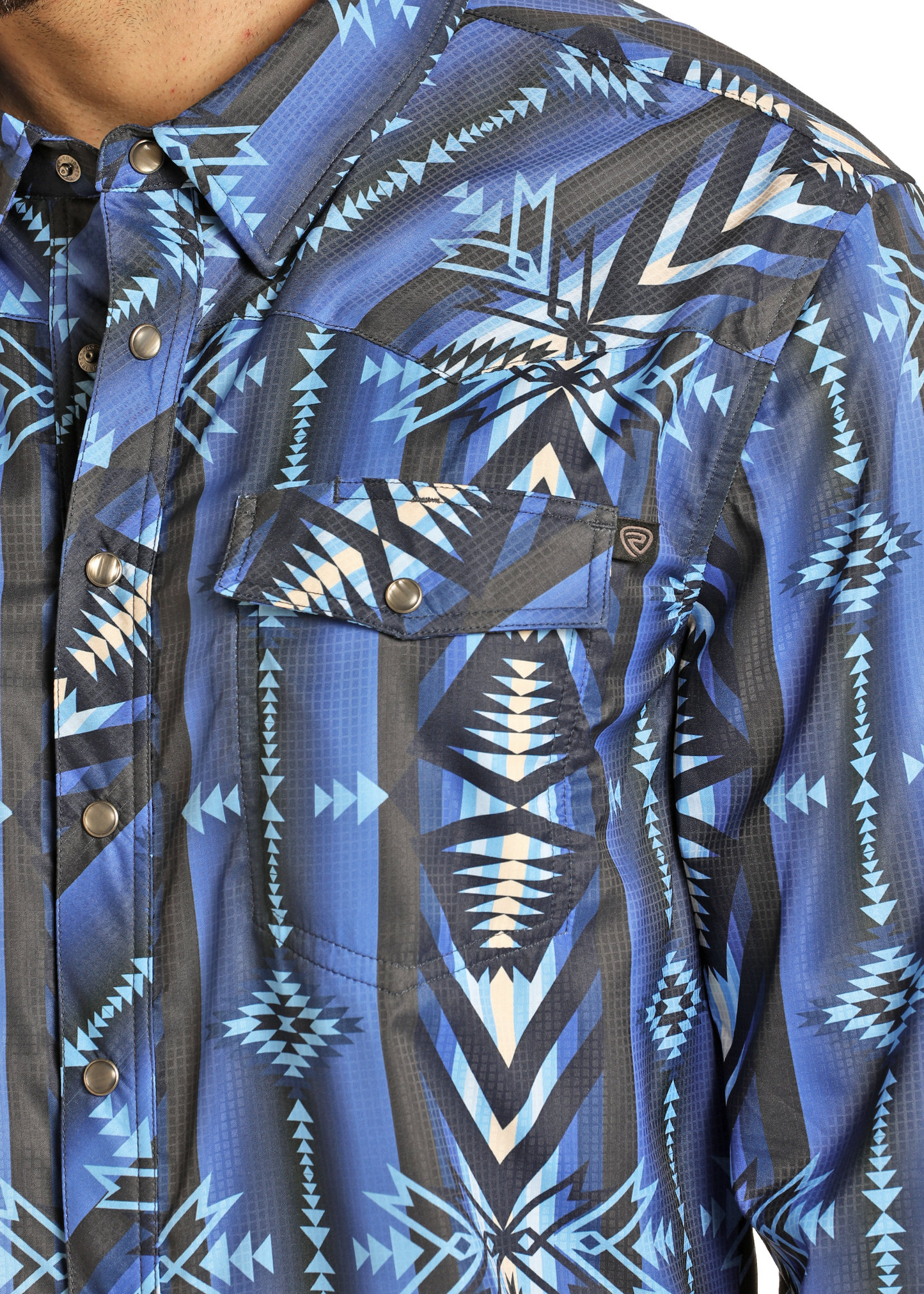 A close-up of the Rock & Roll Denim TEK Western Blue Striped Aztec Long Sleeve Shirt, featuring moisture-wicking fabric.