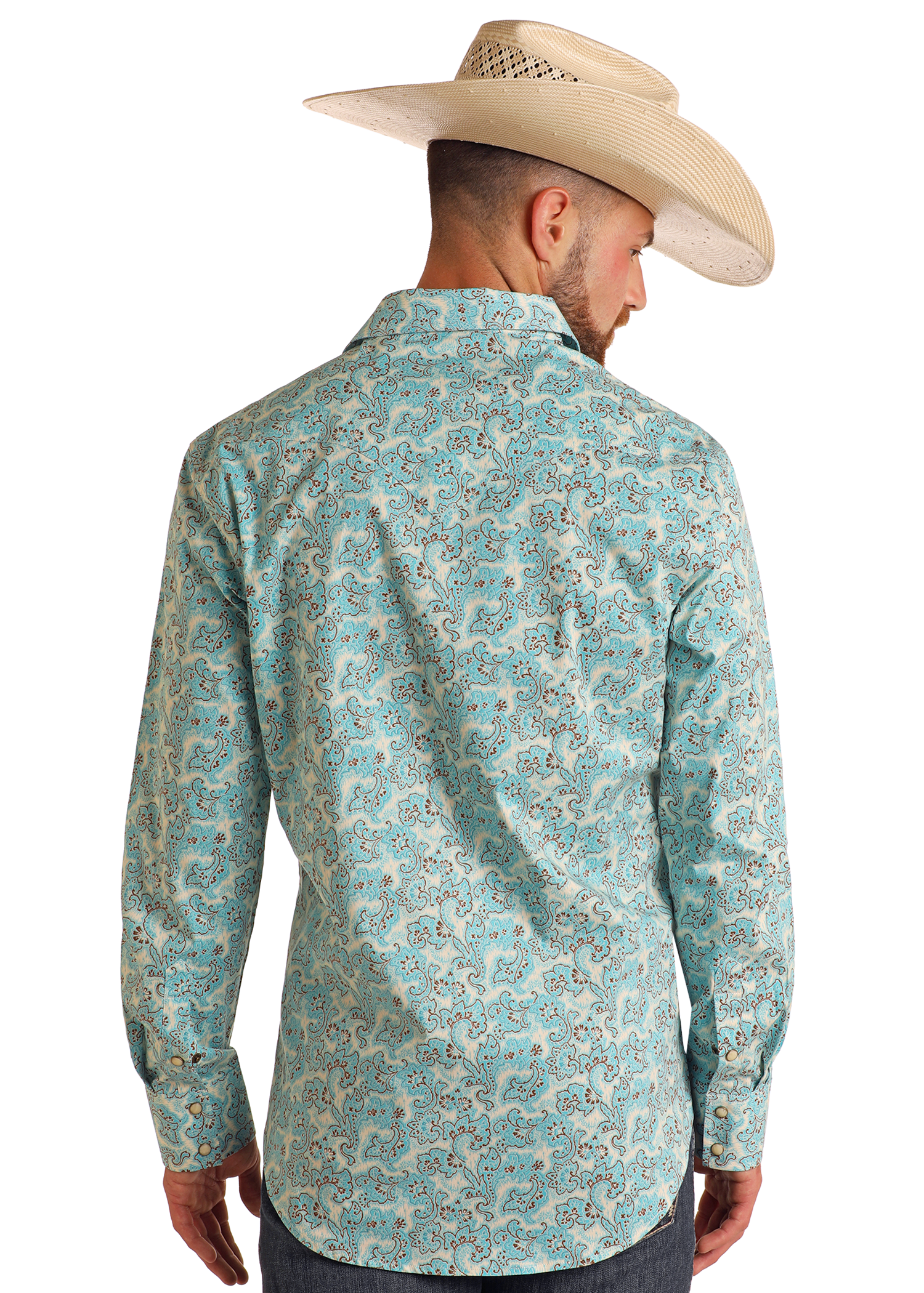 A man faces away, displaying the back of his Rock & Roll Denim Slim Fit Turquoise Paisley Print Long Sleeve Snap Shirt with dark jeans and a light cowboy hat against a plain white background.