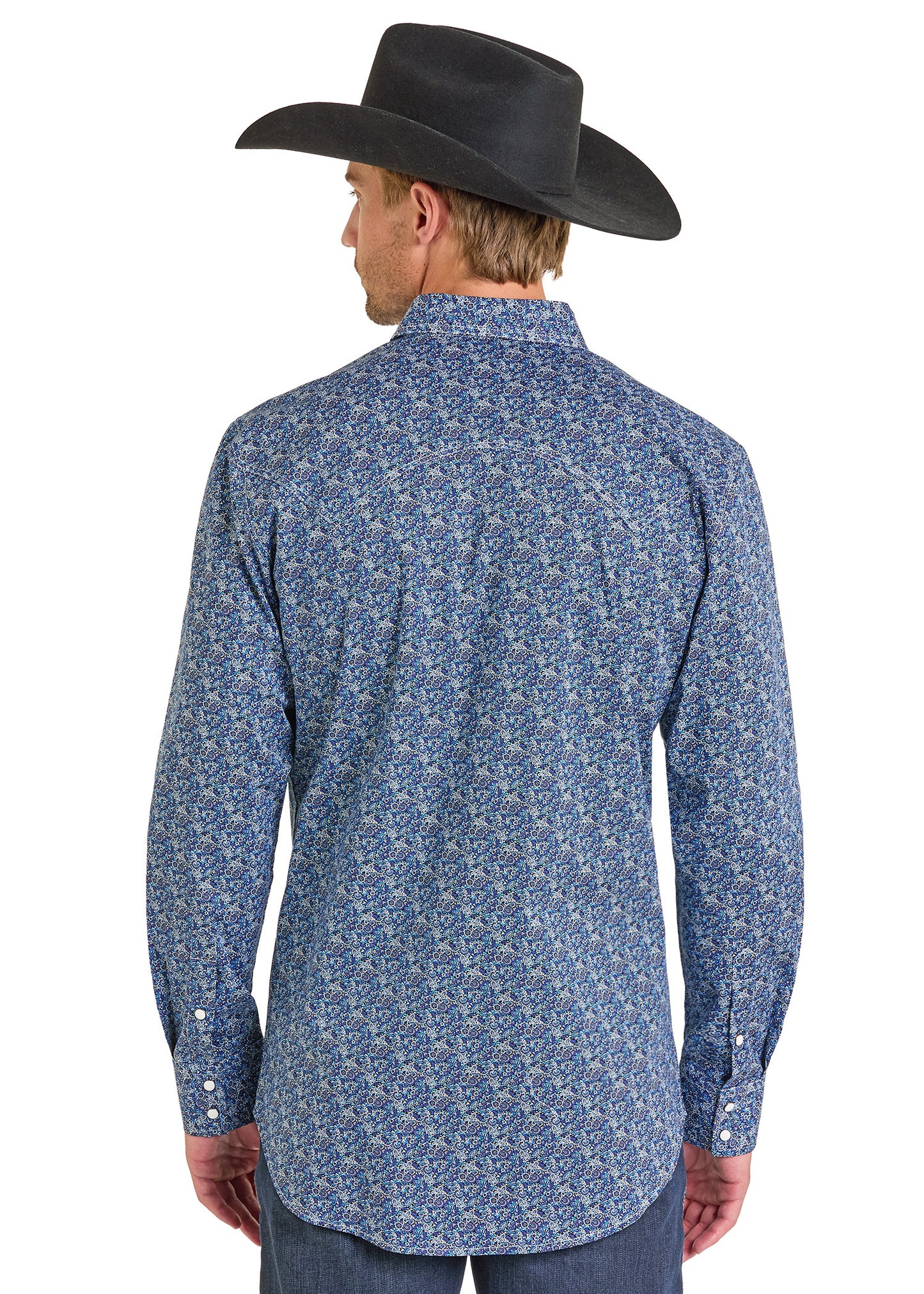 Man wearing a blue patterned shirt and black cowboy hat on a white background