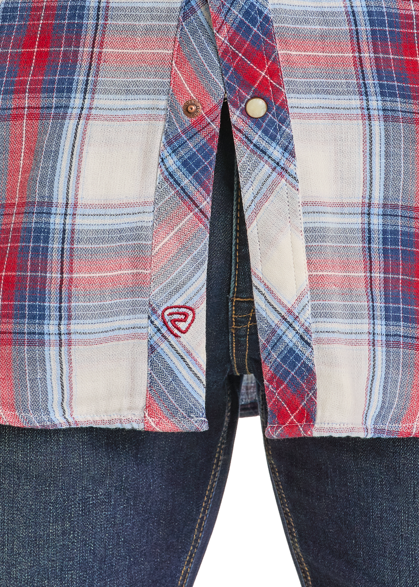 Close-up of a plaid shirt with a brand logo on a white background