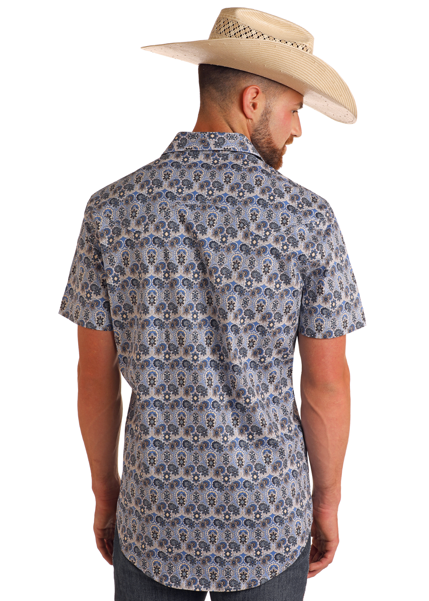A man in a straw cowboy hat models the Rock & Roll Denim Slim Fit Blue Medallion Short Sleeve Snap Shirt, shown from behind against a plain white background.