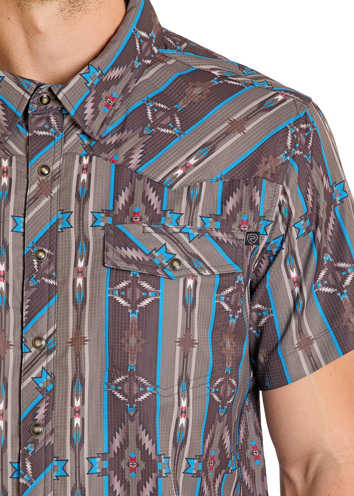 Close-up of a patterned shirt with geometric design