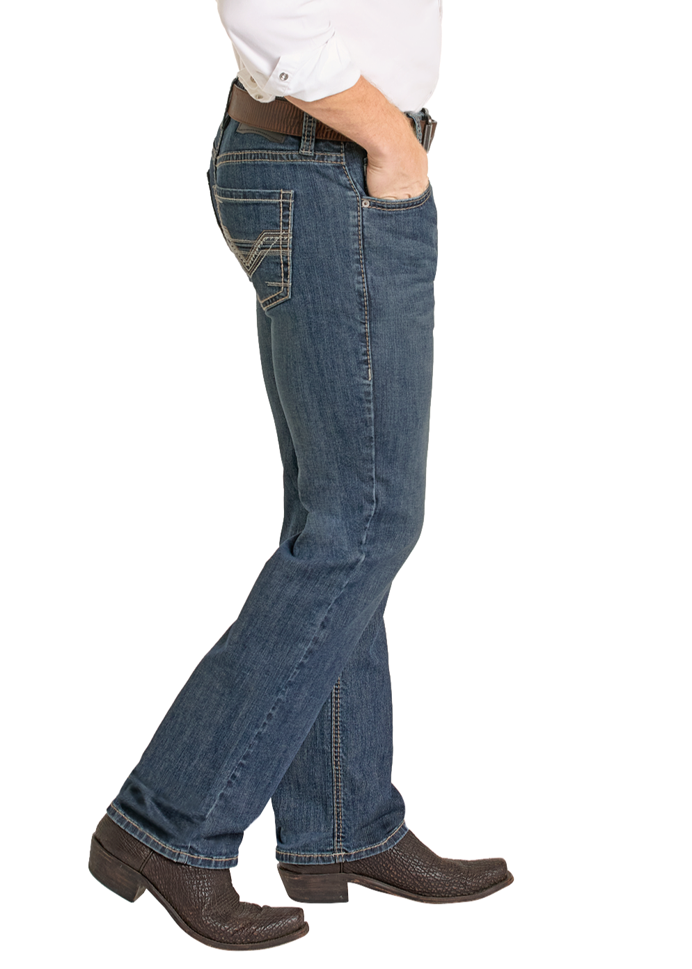 A person in a white shirt, Regular Fit Ladder Stackable Bootcut Jeans by Rock & Roll Denim, a brown belt, and textured cowboy boots stands sideways with one hand in their pocket.