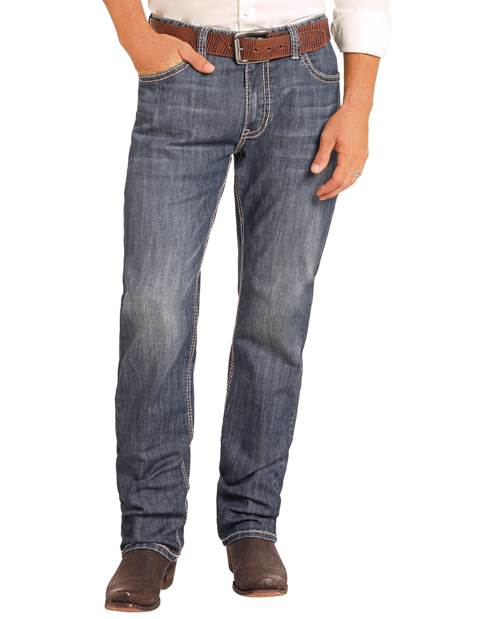 A person wearing Rock & Roll Denim Relaxed Fit Small V Stackable Bootcut Jeans, a brown belt and shoes, and a white shirt with one hand in their pocket stands against a light background.