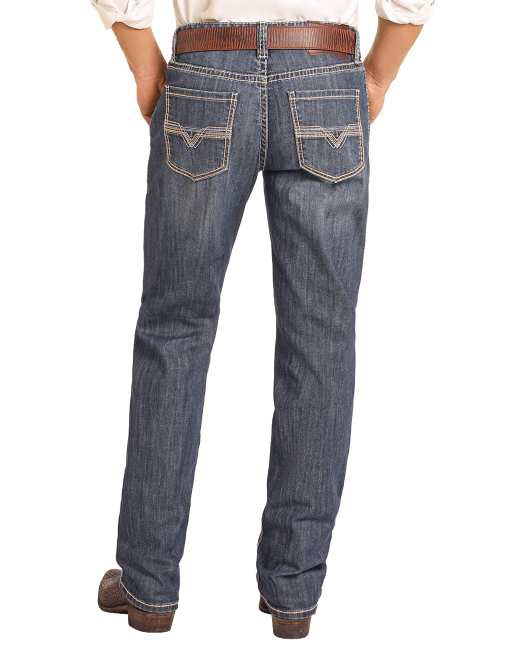 A person is shown from the back wearing Rock & Roll Denim Relaxed Fit Small V Stackable Bootcut Jeans in a blue wash, styled with a brown belt, brown shoes, and a white shirt. The jeans feature decorative stitching on the back pockets.