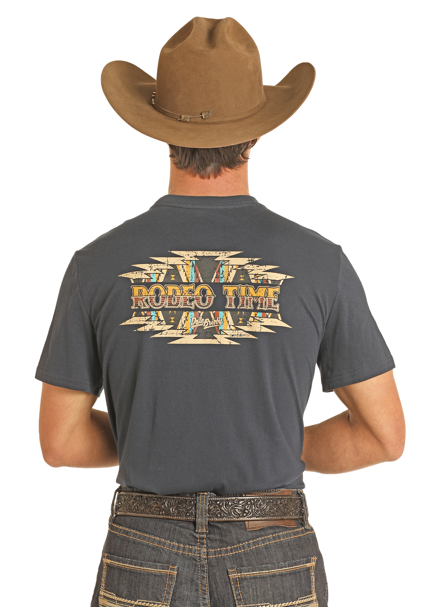 A man in a brown cowboy hat and Western jeans faces away, showing off his Rock & Roll Denim Dale Brisby Rodeo Time Tee with bold "RODEO TIME" lettering on the back.