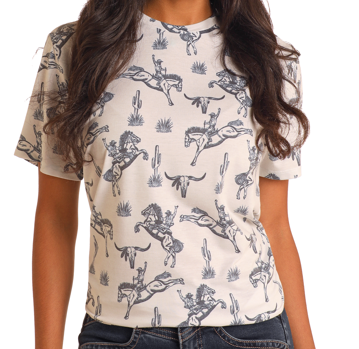 A person with long, wavy hair is shown from shoulders to hips wearing the Rock & Roll Denim Bronco Print Unisex Graphic Tee, featuring a bold Western graphic of cowboys on bucking horses with cacti.