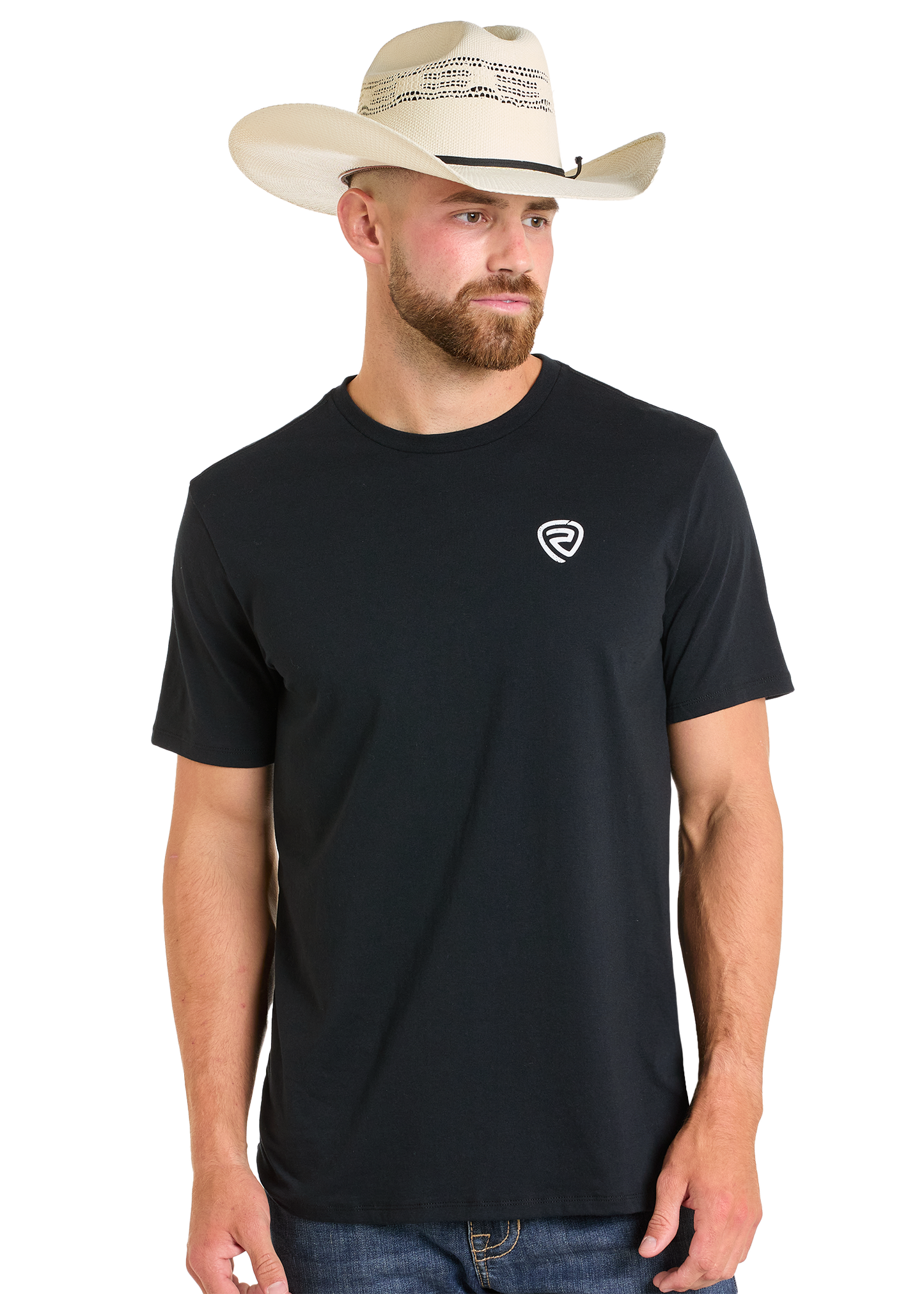 A bearded man in blue jeans and a white cowboy hat wears the Rock & Roll Denim Mexicano Unisex Graphic Tee with a small white chest logo, standing against a plain background—ideal for easygoing everyday wear.