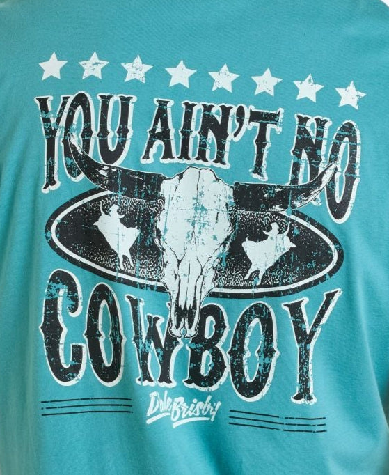 The Dale Brisby You Ain't No Cowboy Graphic Tee by Rock & Roll Denim features a turquoise cowboy design with steers, stars, and silhouettes. Bold text says YOU AIN'T NO COWBOY with Duke Brisket—perfect for western style fans!.