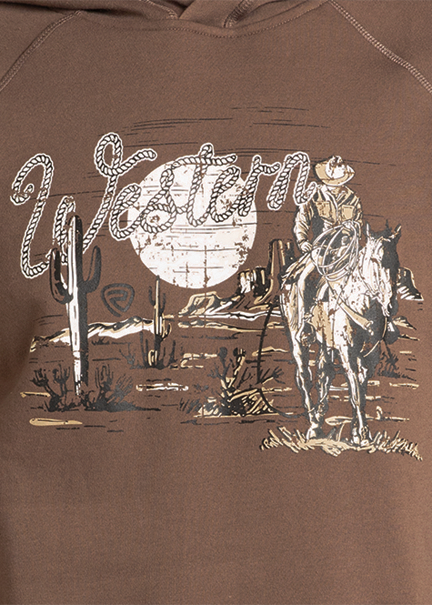 The Rock & Roll Denim Western Graphic Hoodie features a cowboy riding a horse across a desert with cacti, mountains, and a full moon. "Western" in rope-style font completes the classic, casual look on this brown hoodie.